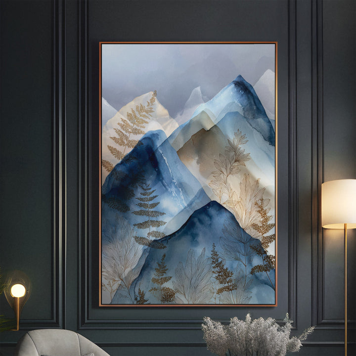 Watercolor layered blue mountain peaks with gold botanical fern details on a, displayed in an elegant dark-paneled interior